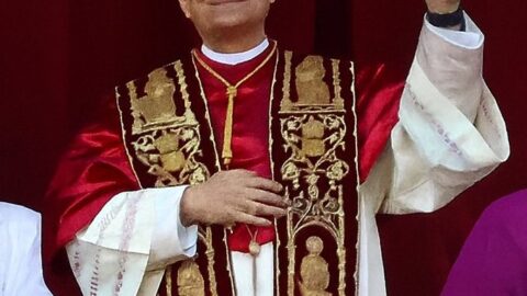 Pope Leo XIV waving in papal vestments