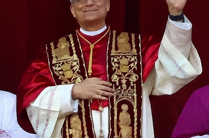 Pope Leo XIV waving in papal vestments