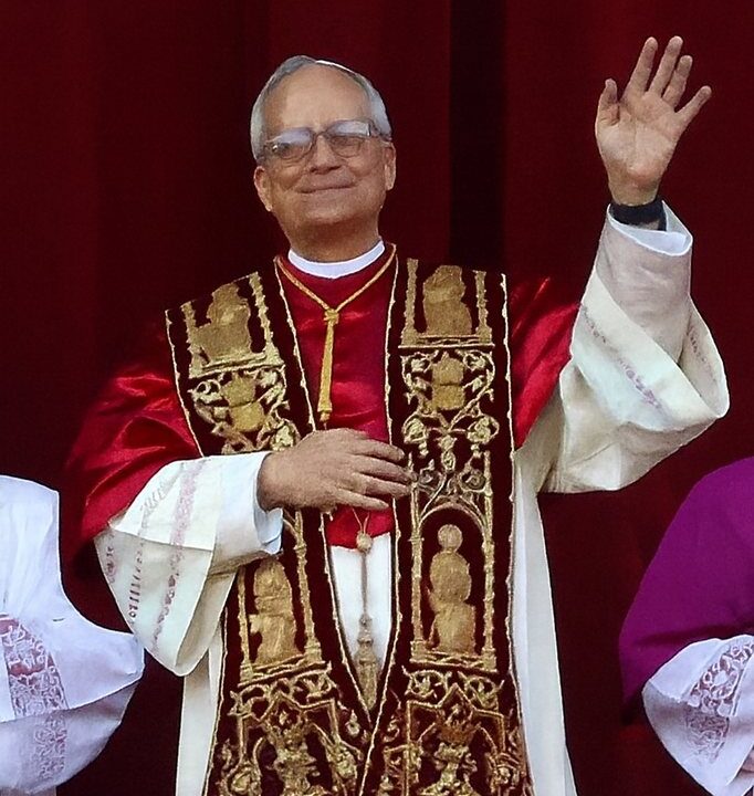 Pope Leo XIV waving in papal vestments