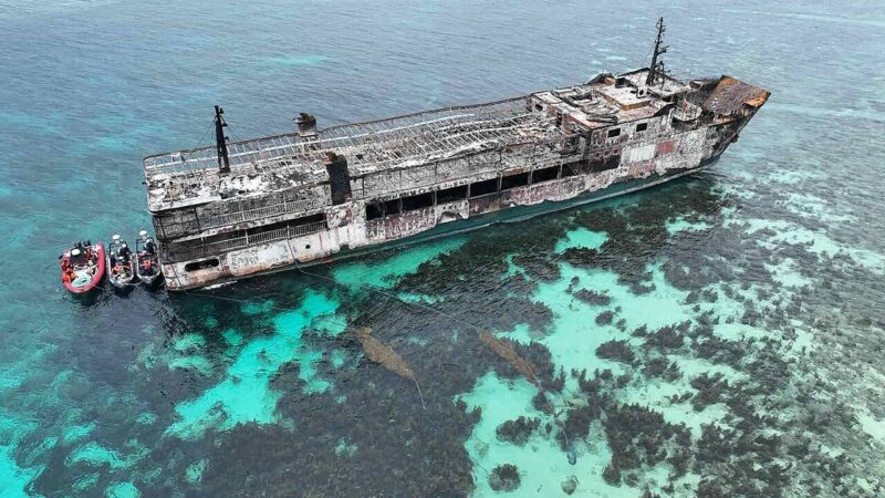 Aerial view of the burnt M/V June Aster off Coron, Palawan